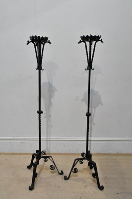 Lot 2408 - A pair of wrought iron pricket candle stands...