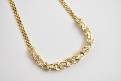 Lot 310 - An 18ct yellow gold and diamond necklace, set...