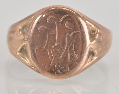 Lot 1173 - A 9ct rose gold signet ring, with faded...