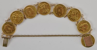 Lot 1294 - A gold bracelet consisting of eight half...