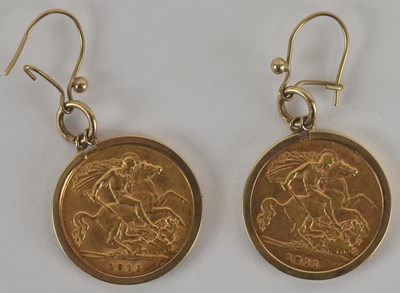 Lot 1237 - A pair of George IV 1911 half sovereign...