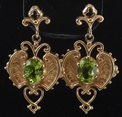 Lot 1244 - A pair of gold earrings in the Middle Eastern...