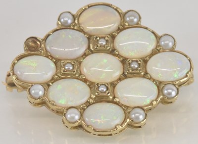 Lot 1272 - An opal and seed pearl brooch, the trapezium...
