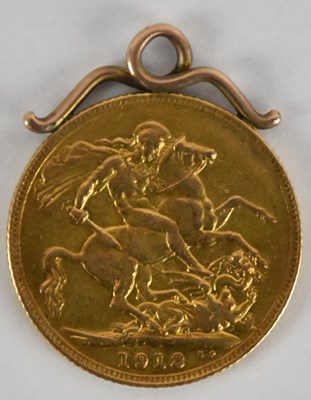 Lot 1393 - A George V 1913 full sovereign, with later...