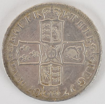 Lot 1414 - A Queen Anne 1707 early milled silver crown,...