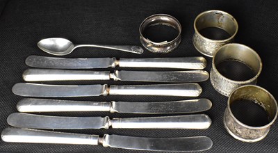 Lot 888 - Four hallmarked silver non-matching napkin...