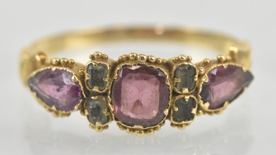 Lot 1156 - An antique yellow metal pink tourmaline three...