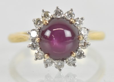 Lot 1109 - An 18ct yellow gold cabochon star ruby and...