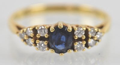 Lot 1157 - An 18ct yellow gold sapphire and diamond set...