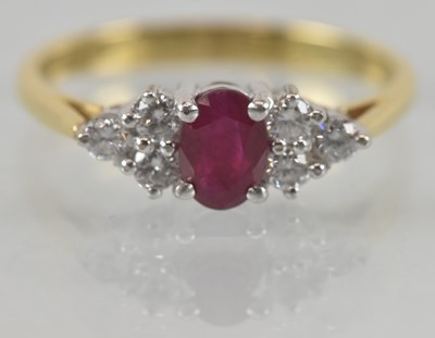 Lot 1160 - An 18ct yellow gold ruby and diamond set half...