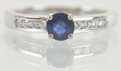 Lot 1136 - An 18ct yellow gold sapphire solitaire ring,...