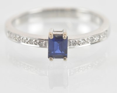 Lot 1137 - An 18ct white gold sapphire solitaire ring,...