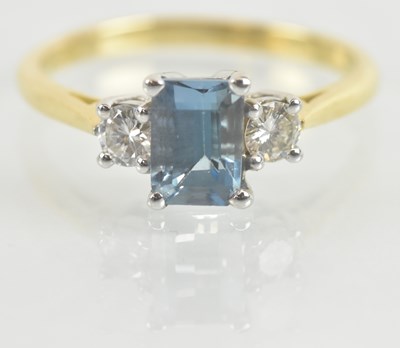 Lot 1122 - An 18ct yellow gold aquamarine and diamond set...