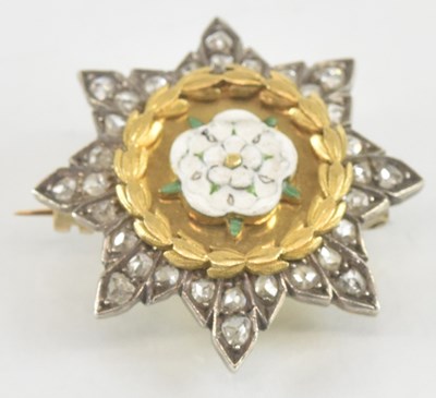 Lot 1270 - A yellow metal diamond set Yorkshire Regiment...