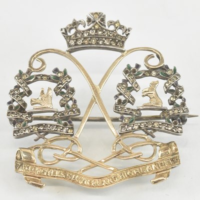 Lot 1276 - A George V white and yellow metal paste set...