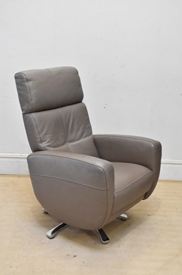 Lot 2093 - A contemporary brown leather reclining elbow...