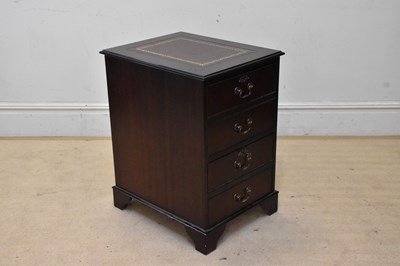 Lot 2107 - A reproduction two drawer filing cabinet, with...