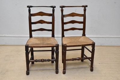 Lot 2198 - Two Macclesfield type ladderback rush seated...