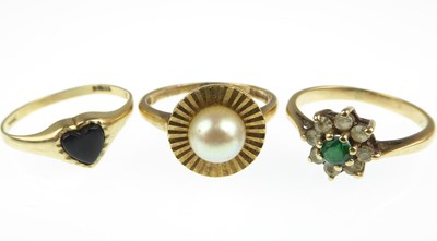 Lot 1097 - Three 9ct gold dress rings comprising one with...