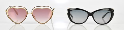 Lot 711 - CHLOE; a pair of heart shaped gold tone metal...