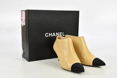 Lot 796 - CHANEL; a pair of tan soft goatskin leather...