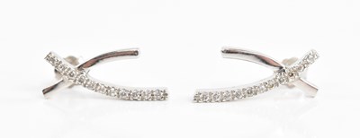 Lot 306 - A pair of 18ct white gold and cubic zirconia...