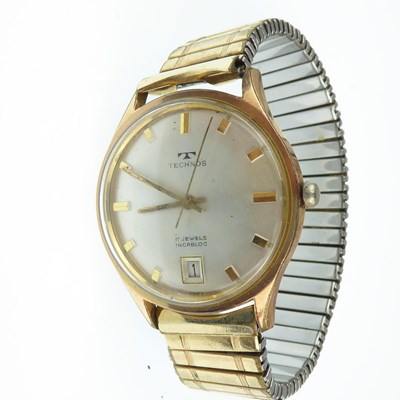 Lot 1297 - TECHNOS; a gentlemen's gold plated wristwatch,...