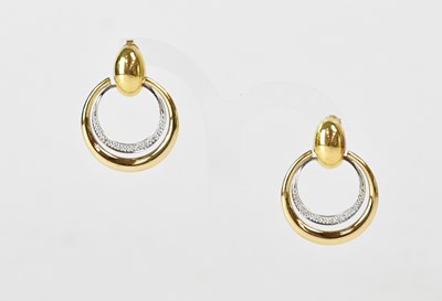 Lot 1095 - A pair of 18ct yellow and white gold stud...