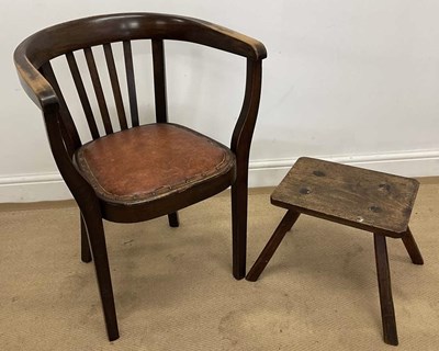 Lot 770 - An elm milking stool and smoking chair, 76cm high
