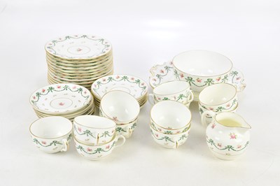 Lot 1677 - COALPORT; a floral decorated part tea service...