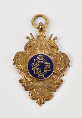Lot 12 - A 9ct yellow gold and enamelled cricket...