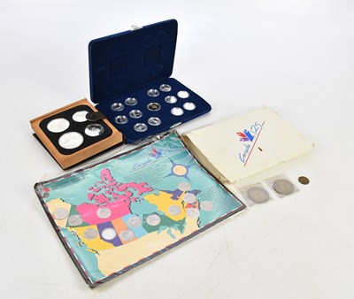 Lot 1446 - A collection of coins including Montreal 1976...