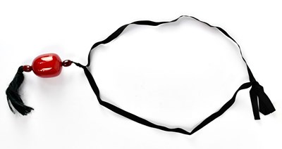 Lot 870 - A large cherry amber style pendant comprising...
