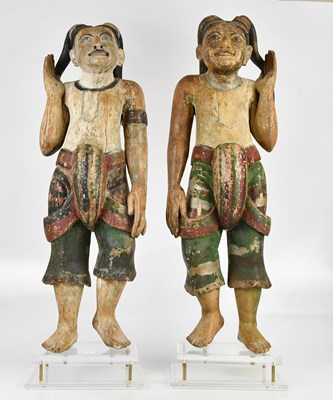 Lot 38 - A pair of antique Thai painted wooden figures,...