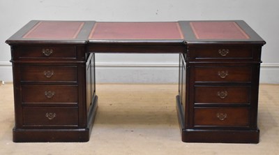 Lot 2072 - A reproduction cherry wood inverted breakfront...