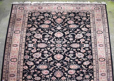 Lot 126 - A Caucasian wool carpet of blue and cream...