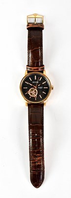 Lot 1160 - BULOVA; an automatic wristwatch, the black...
