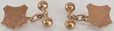 Lot 1529 - A pair of 9ct rose gold cufflinks of shield...