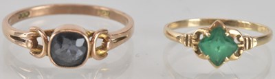 Lot 1328 - A 9ct gold ring with claw set square emerald,...