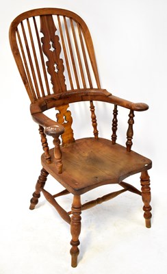 Lot 34 - A 19th century Provincial Windsor stick back...