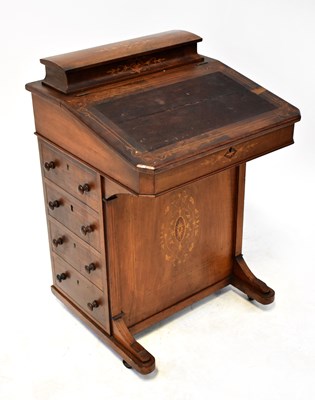Lot 104 - A 19th century walnut Davenport, the upper...