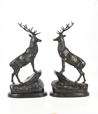 Lot 2381 - A pair of bronze cast metal stags, after Jules...