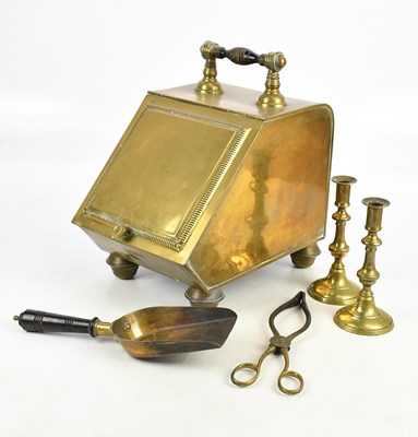 Lot 2394 - A Georgian brass coal purdonium, with turned...