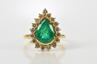 Lot 33 - A yellow metal emerald and diamond cocktail...