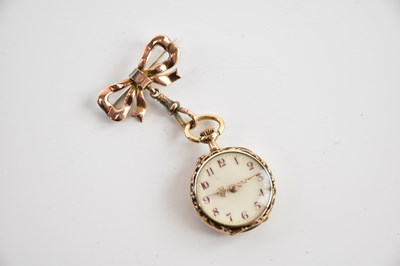 Lot 513 - A 14ct yellow gold enamel decorated crown wind...