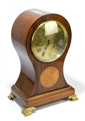 Lot 2621 - An Edwardian inlaid mahogany balloon mantel...