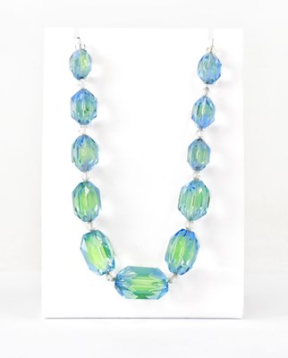 Lot 1093 - A single-strand blue and green Uranium glass...