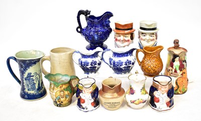 Lot 245 - Fourteen vintage and antique water jugs,...