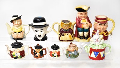 Lot 235 - Eight vintage novelty teapots, height of...