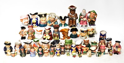 Lot 233 - Fifty various vintage character and Toby jugs...
